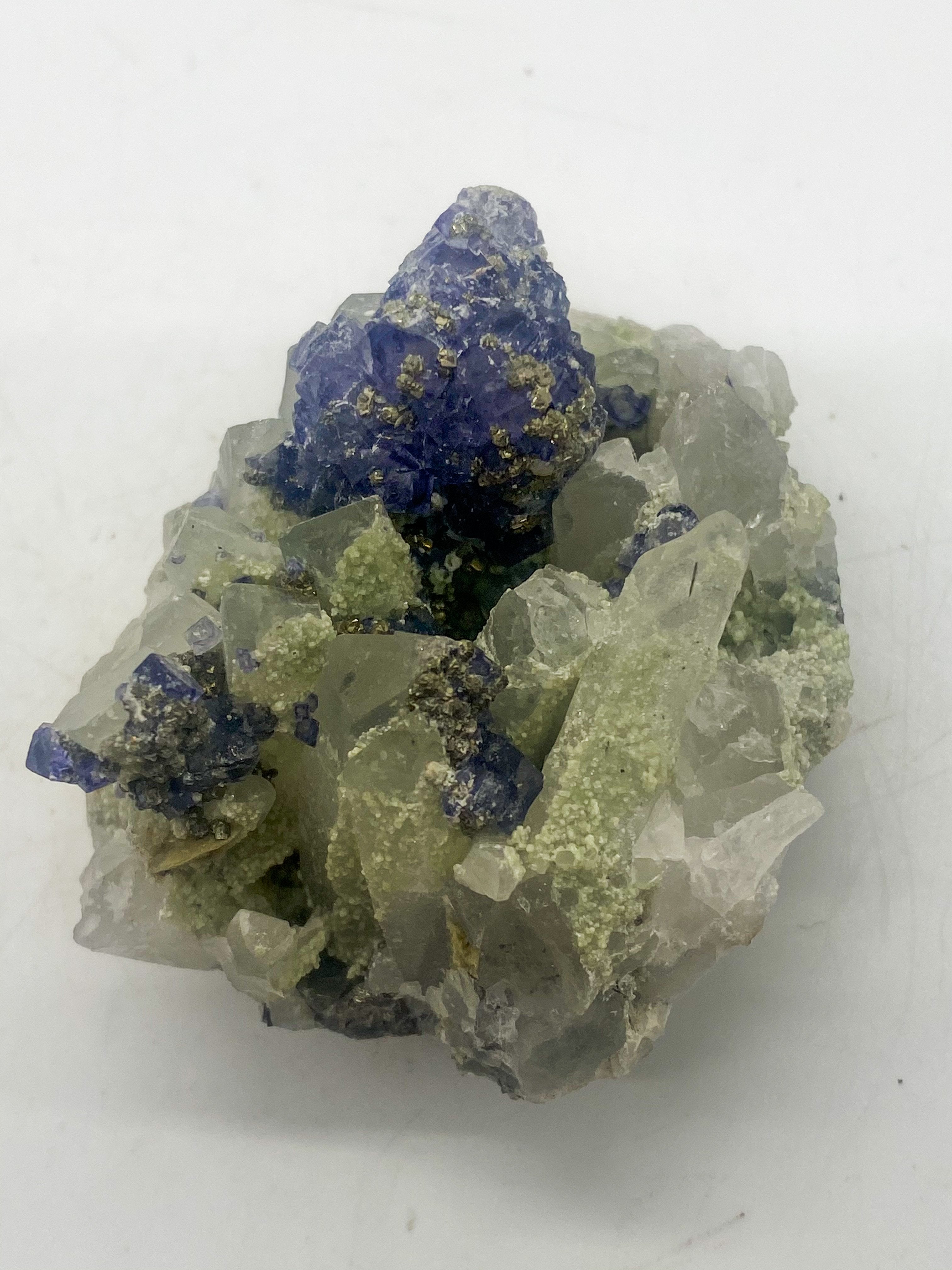 Purple Tanzanite on Quartz with Muscovite and Pyrite