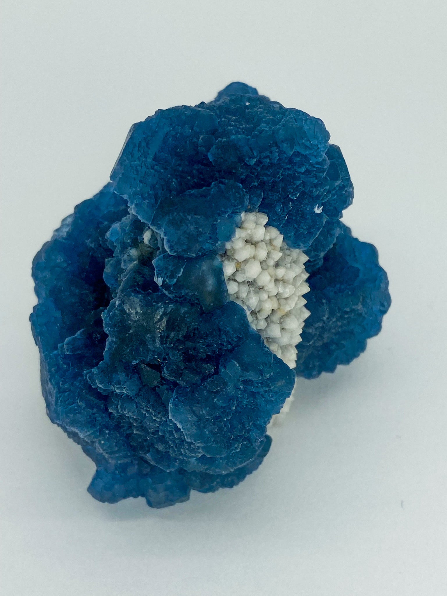 Blue Step Fluorite on Candle Quartz