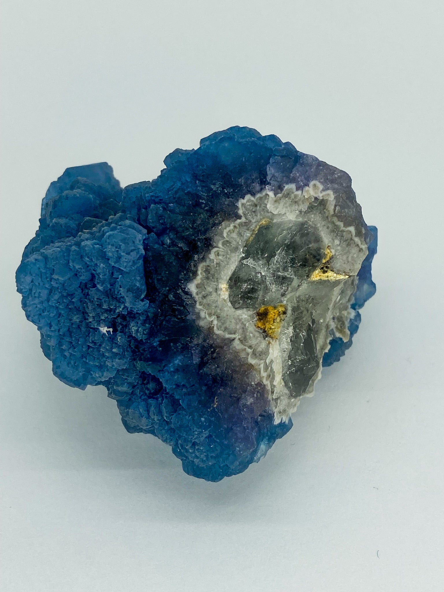 Blue Step Fluorite on Candle Quartz