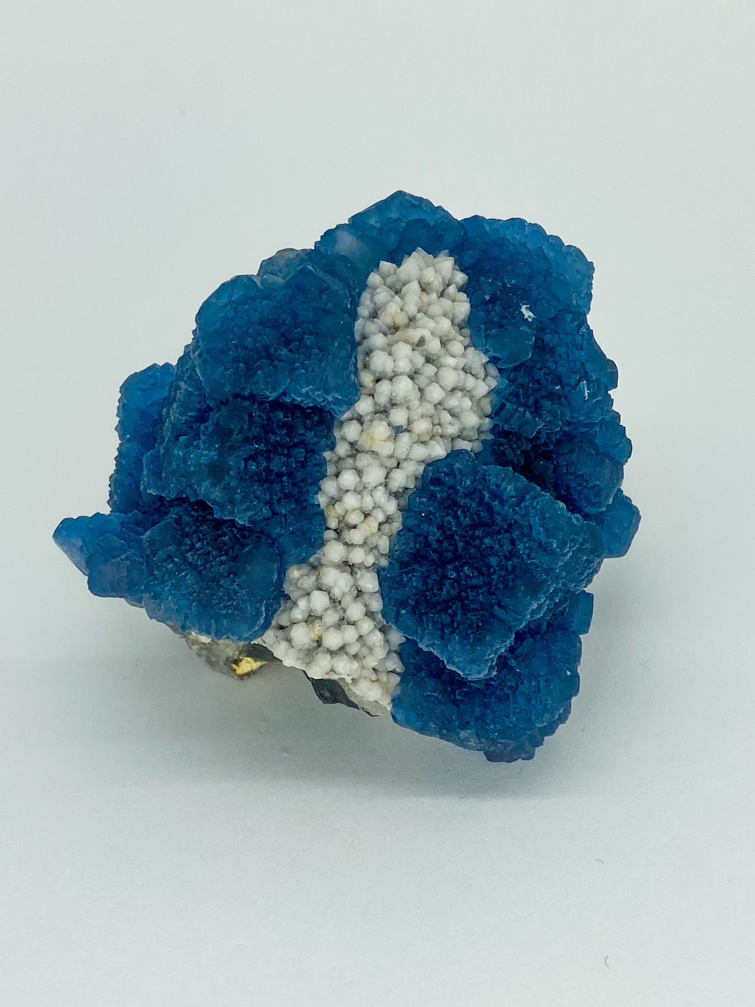 Blue Step Fluorite on Candle Quartz