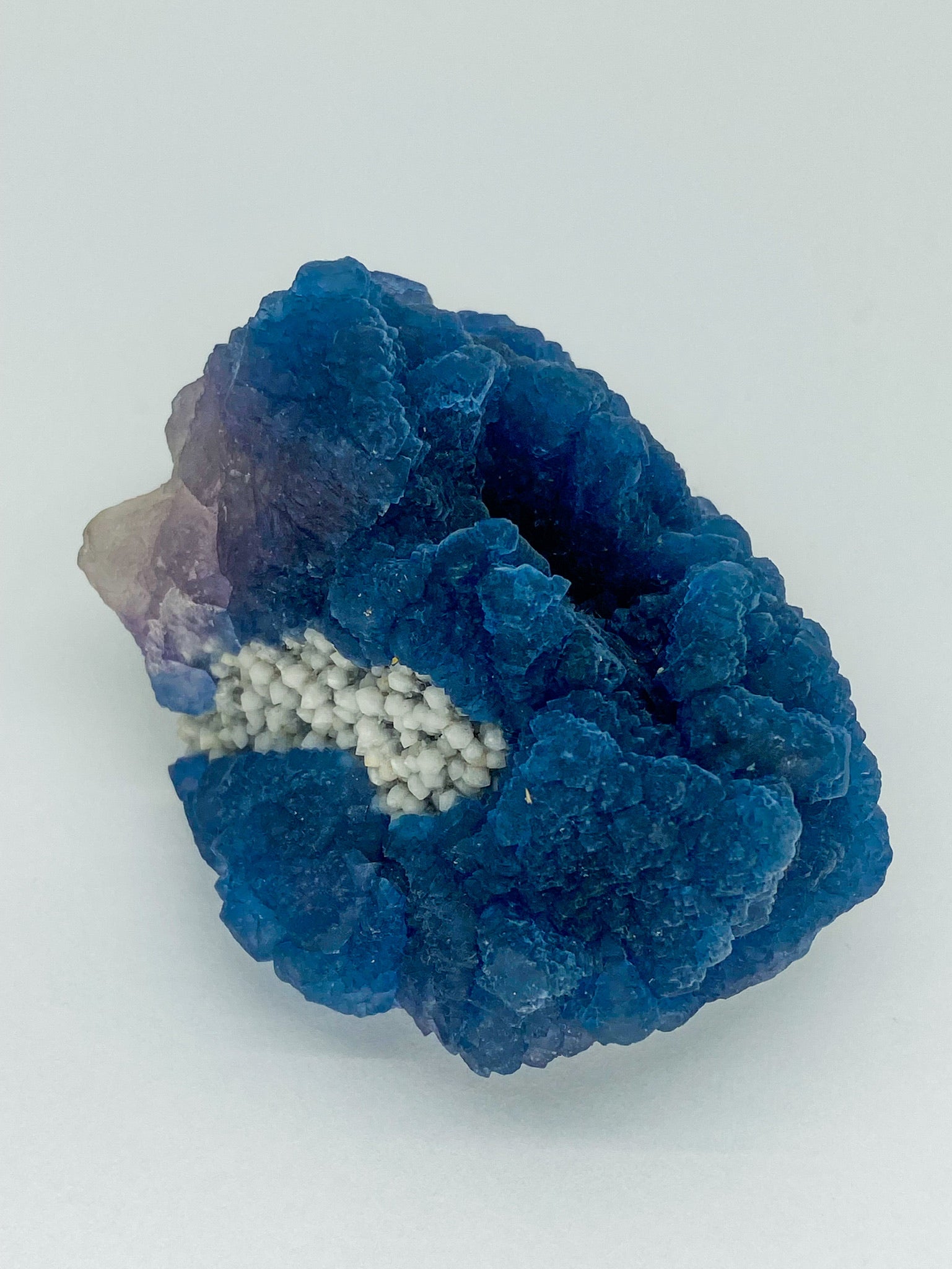 Blue Step Fluorite on Candle Quartz