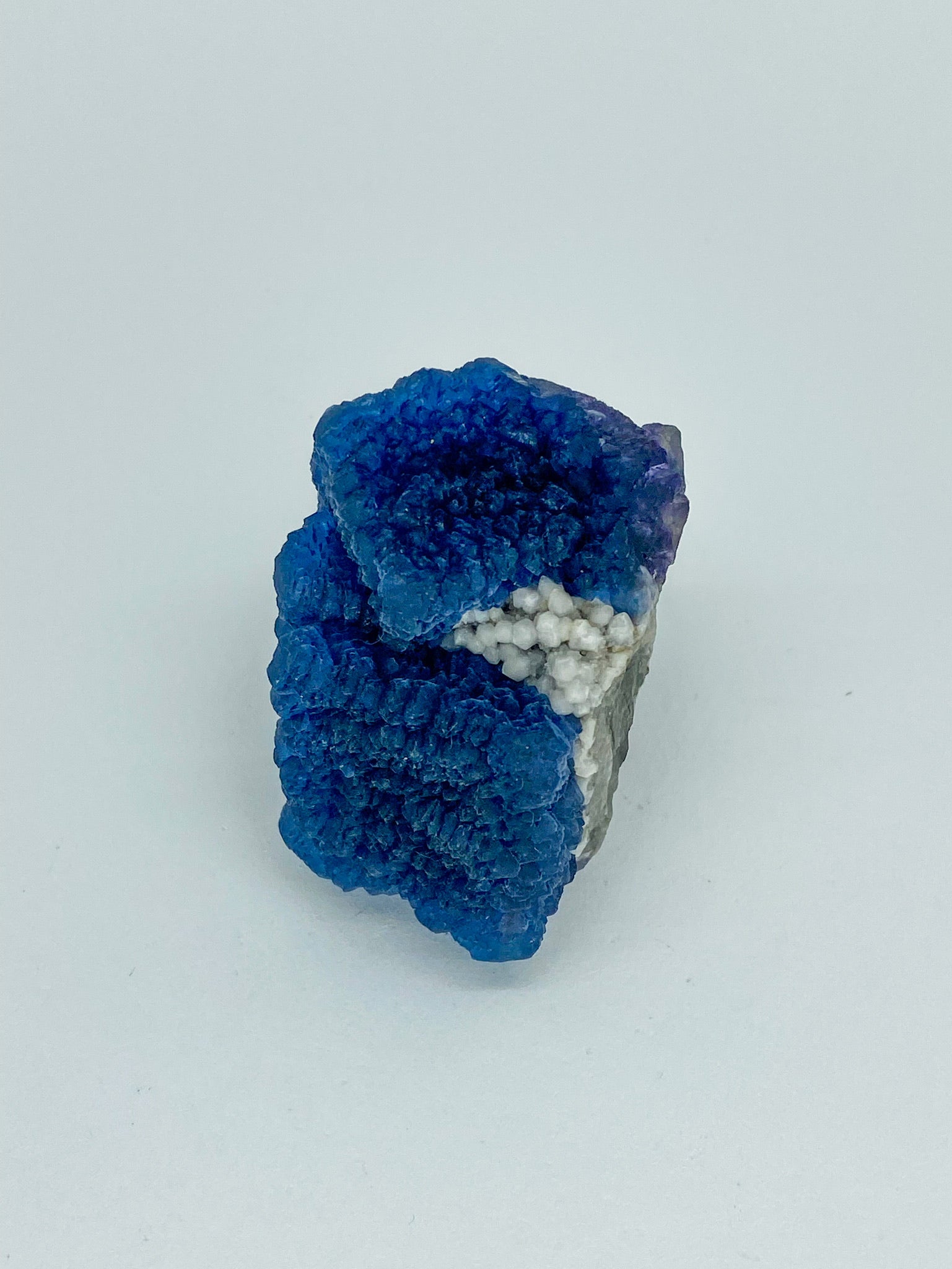 Blue Step Fluorite on Candle Quartz